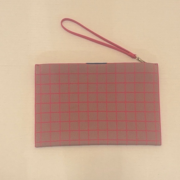 Rothy’s pink and tan Grid Pattern Clutch - Picture 1 of 6